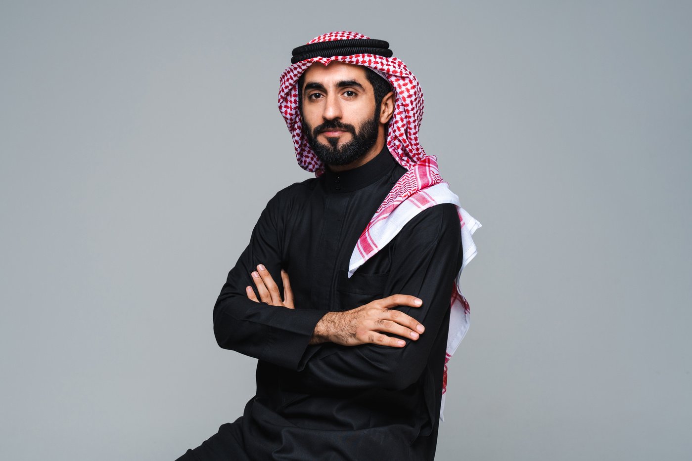 Handsome saudi arabian middle-eastern man with traditional thwab